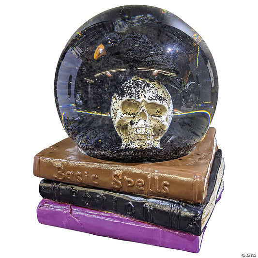 Skull water globe on spell books